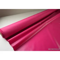Tissu polyester fuchsia déperlant pour parapluie .