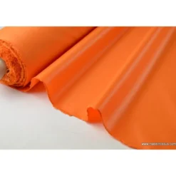Tissu polyester orange déperlant pour parapluie .