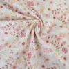 Tissu popeline Ambroise fleurs pastel roses fond blanc cassé