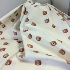 Tissu popeline Brun motif tête d'ours fond écru