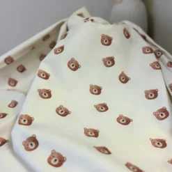 Tissu popeline Brun motif tête d'ours fond écru