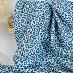 Tissu Popeline de coton motif léopard bleu turquoise