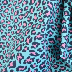 Tissu Popeline de coton motif léopard bleu turquoise
