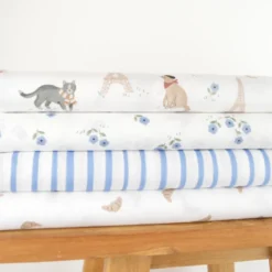 Tissu popeline de coton motif croissants fond blanc - OEKO TEX