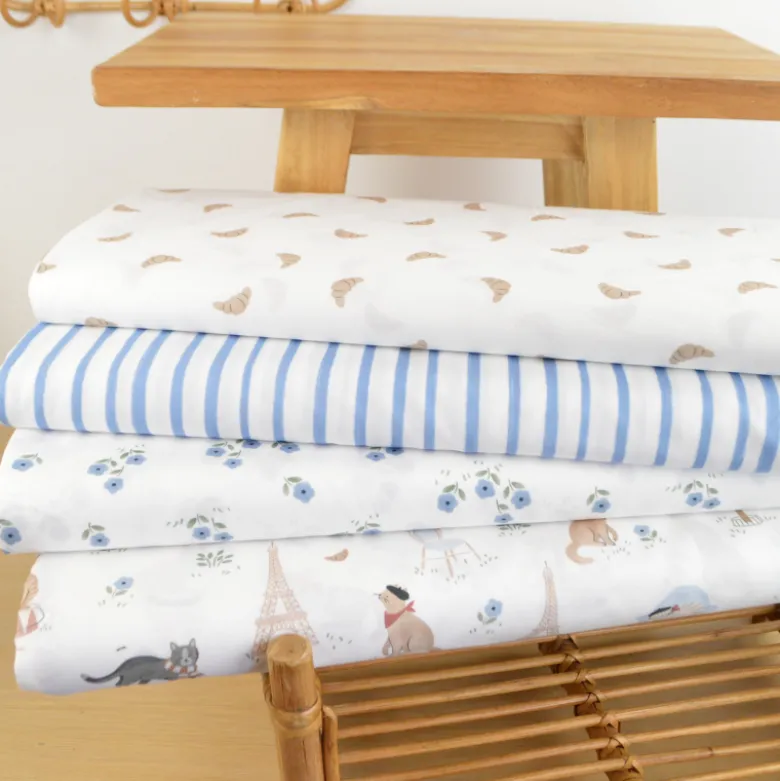 Tissu popeline de coton motif croissants fond blanc - OEKO TEX