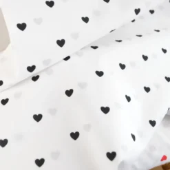 Tissu popeline de coton motif coeurs noirs fond blanc