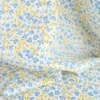 Tissu popeline de coton Poppy – motif fleurs bleues et ocre