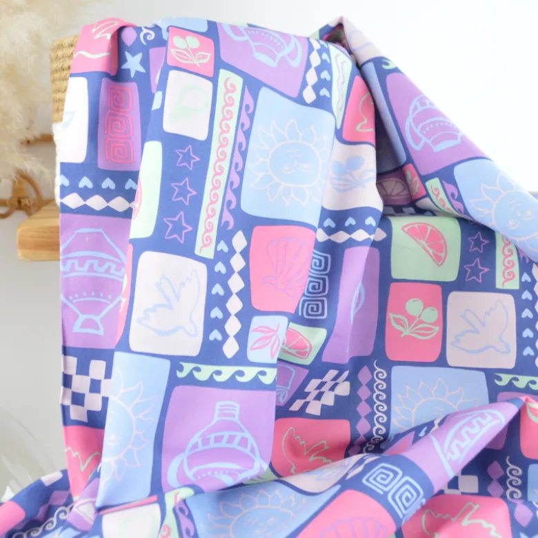 Tissu popeline de coton Poppy – motif patchwork d'été fond jean