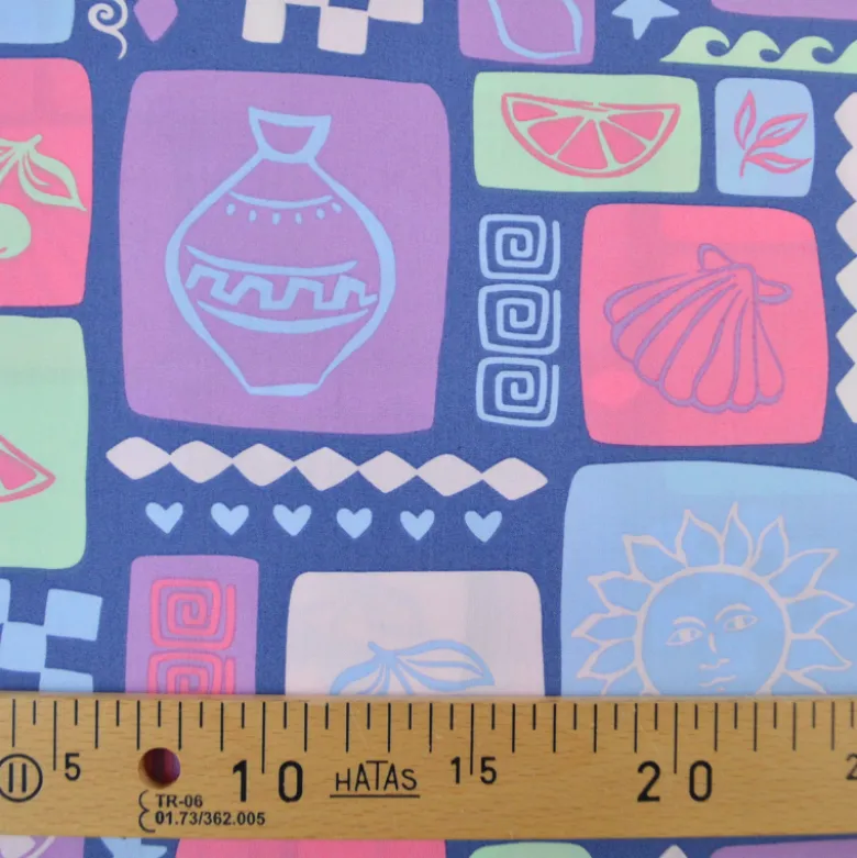 Tissu popeline de coton Poppy – motif patchwork d'été fond jean