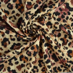 Tissu popeline de viscose Leolynx motif léopard chocolat fond beige
