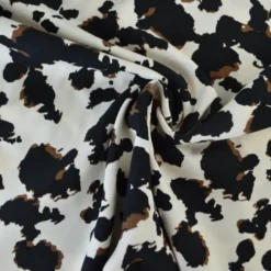 Tissu popeline de viscose - motif graphique typé léopard fond écru