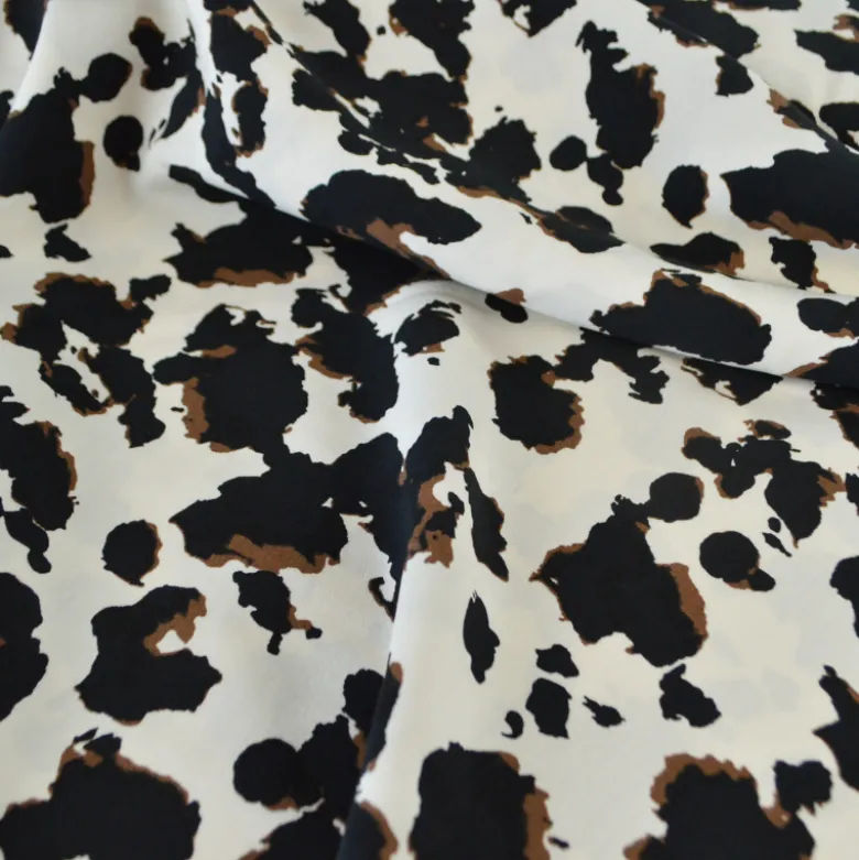 Tissu popeline de viscose - motif graphique typé léopard fond écru