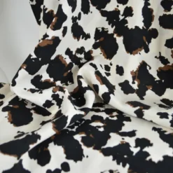 Tissu popeline de viscose - motif graphique typé léopard fond écru