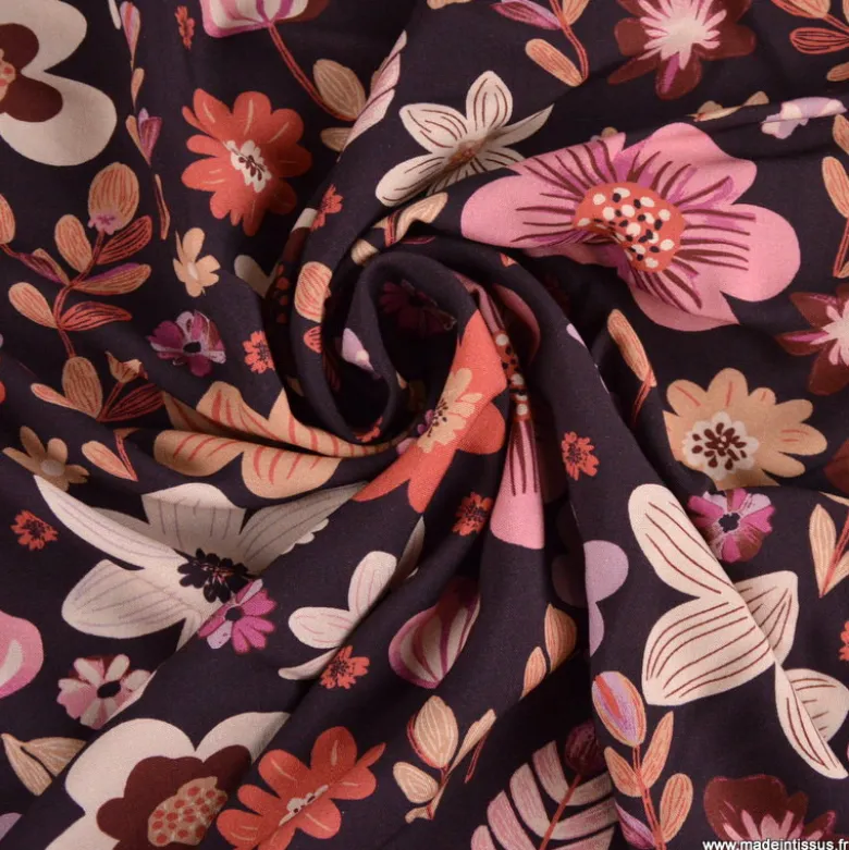Tissu popeline de viscose Osaya motif fleurs roses fond bordeaux
