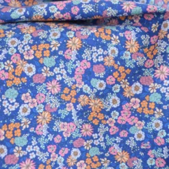 Tissu Popeline fleuri fond bleu indigo