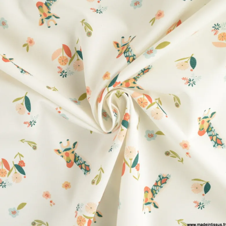 Tissu popeline motif girafes et fleurs roses fond bleu - Oeko tex