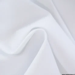 Tissu pour pantalon d'équitation maille stretch blanc.