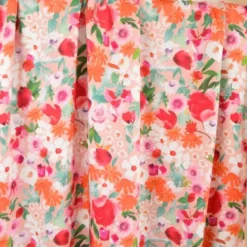 Tissu Satin de viscose fleuri fond rose poudré