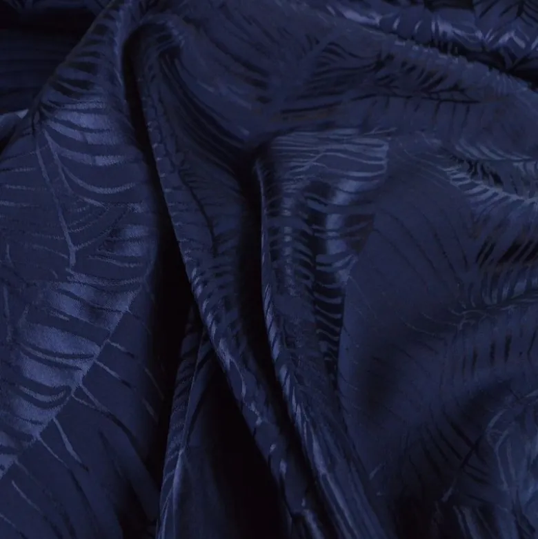 Tissu satin de viscose motif exotique fond bleu marine