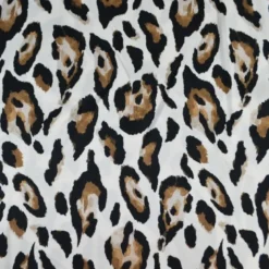 Tissu satin de viscose motif Léopard fond blanc cassé