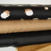 Tissu Satin de viscose motif leopard camel fond Noir