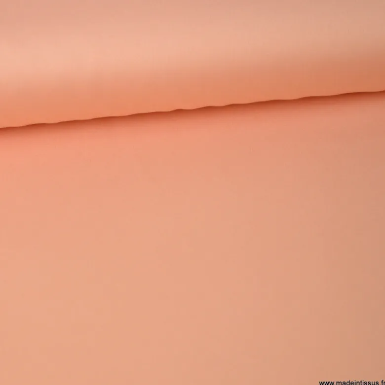 Tissu satin microfibre fluide uni Corail.