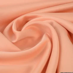 Tissu satin microfibre fluide uni Corail.