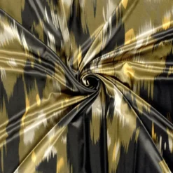 Tissu Satin motif style Ikat - Noir et vert