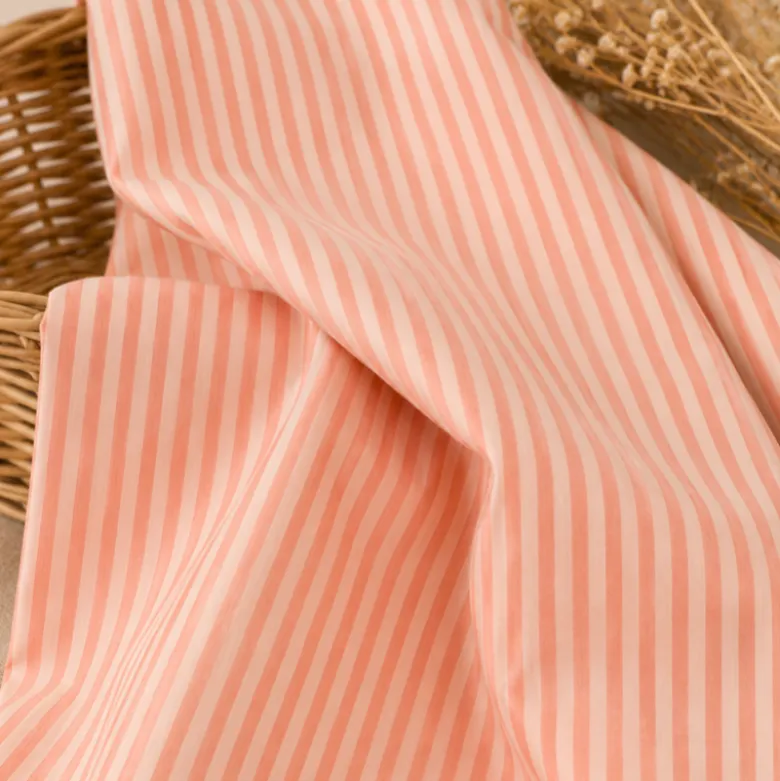 Tissu seersucker à rayures larges - Corail et Nude