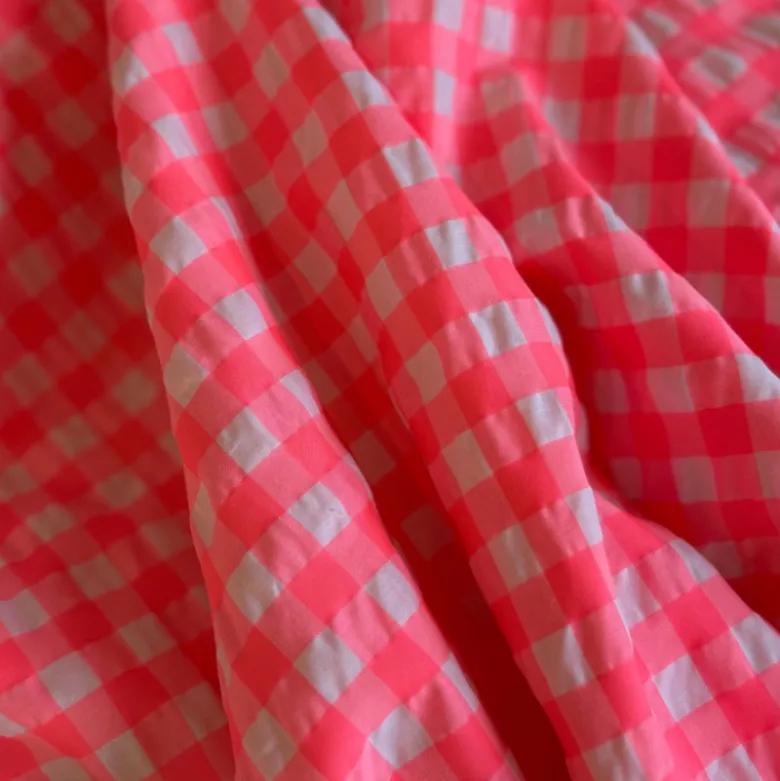 Tissu seersucker Vichy grands carreaux rose fluo