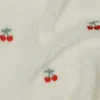 Tissu Sherpa brodée motif cerises fond écru