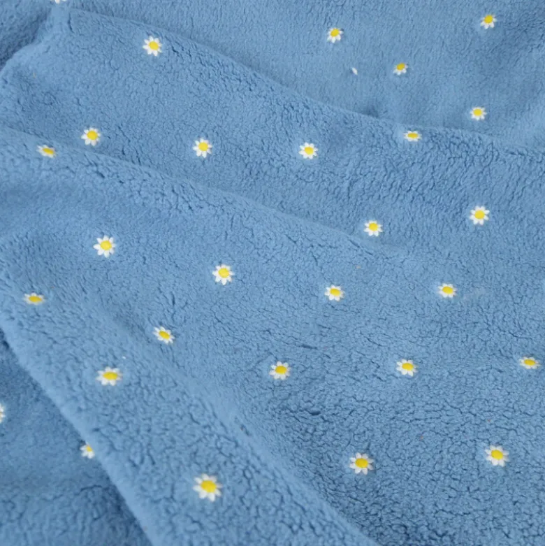 Tissu Sherpa Camilla brodée fleurs fond bleu - OEKO TEX