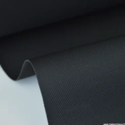 Tissu simili cuir pointillé noir pour sellerie moto.