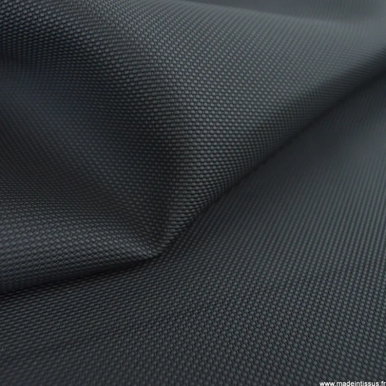 Tissu simili cuir pointillé noir pour sellerie moto.