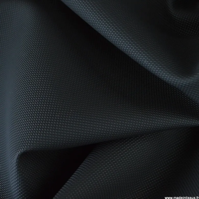 Tissu simili cuir pointillé noir pour sellerie moto.