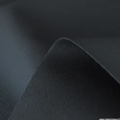 Tissu simili cuir pointillé noir pour sellerie moto.