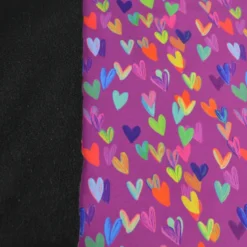 Tissu softshell motif cœurs multicolores fond violet rose