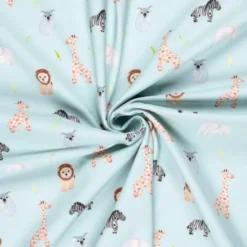 Tissu Softshell motifs animaux fond menthe clair