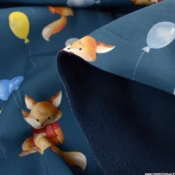 Tissu Softshell motifs renards et ballons bleu marine