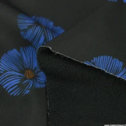 Tissu Softshell Poppy motifs fleurs bleues fond noir - oeko tex