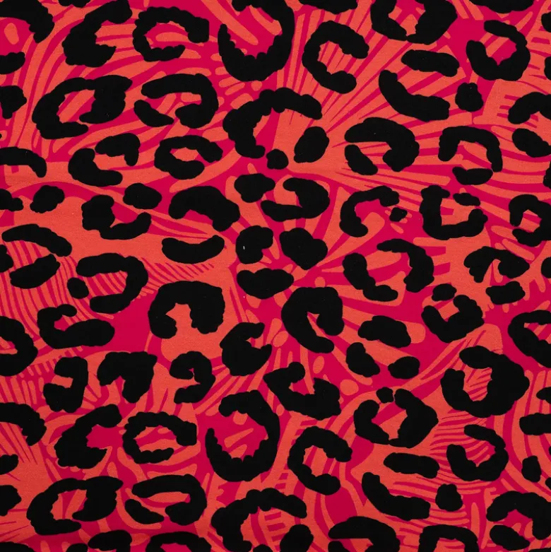 Tissu Sweat French Terry léopard fond Saumon