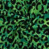 Tissu Sweat French Terry léopard fond Vert
