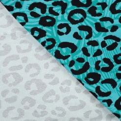 Tissu Sweat French Terry léopard fond bleu Tiffany
