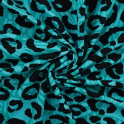 Tissu Sweat French Terry léopard fond bleu Tiffany
