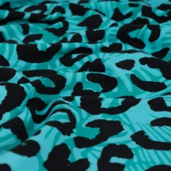 Tissu Sweat French Terry léopard fond bleu Tiffany