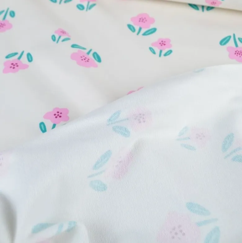 Tissu Sweat French Terry Motif fleurs fond blanc cassé - Poppy