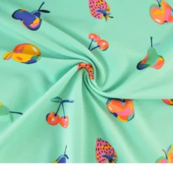 Tissu Sweat French terry Sweat motif fruits fond turquoise - OEKO TEX