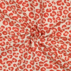 Tissu Sweat gratté motif Léopard orange fond écru