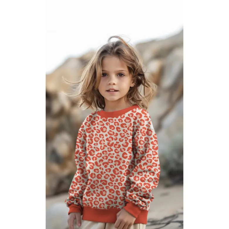 Tissu Sweat gratté motif Léopard caramel fond écru