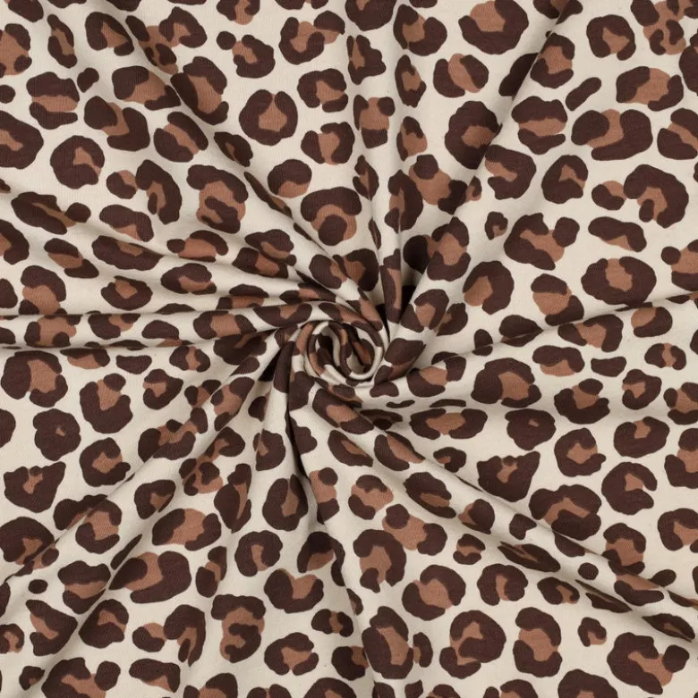 Tissu Sweat gratté motif Léopard caramel fond écru